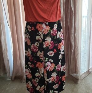 Inseam measured. Floral print, slits on sides.